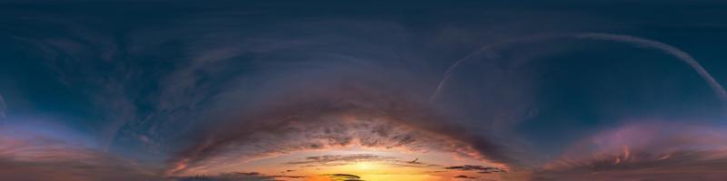 Seamless hdri panorama 360 degrees angle view of dark blue sky before sunset with beautiful awesome clouds with zenith for use in 3d graphics or game development as sky dome or edit drone shot photo