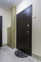 door in modern entrance hall of corridor in expensive apartments photo