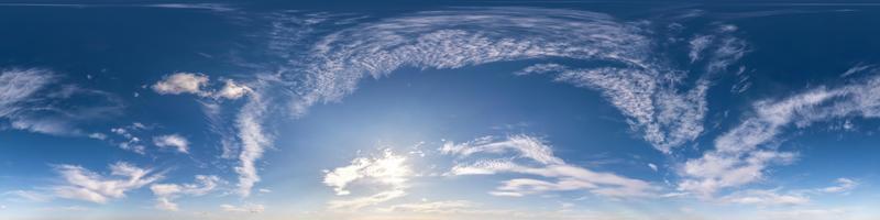 blue sky with beautiful fluffy cumulus clouds without ground. Seamless hdri panorama 360 degrees angle view without ground for use in 3d graphics or game development as sky dome or edit drone shot photo