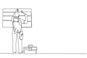 Single continuous line drawing professional worker in uniform hammering. Nail in wood. Construction work at home. Building, construction and repair work services. One line draw graphic design vector