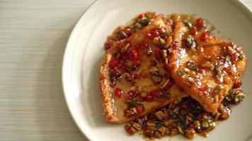 Fried Snapper Belly with Spicy Garlic Soy Sauce in Asian Style video