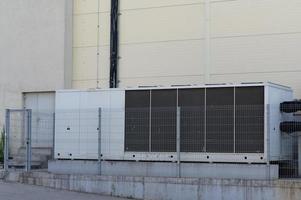 Large industrial air conditioner on the side of the mall. photo