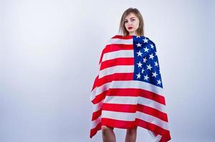 Cute girl with american usa flag isolated on white background. photo