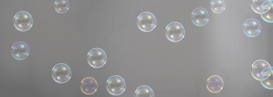 Soap bubble drop or Shampoo bubbles floating like flying in the air photo