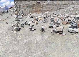 Stack of stones on top of the mountain arranged for meditation. photo