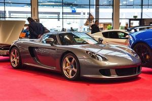 FRIEDRICHSHAFEN - MAY 2019 silver PORSCHE CARRERA GT 2002 at Motorworld Classics Bodensee on May 11, 2019 in Friedrichshafen, Germany photo