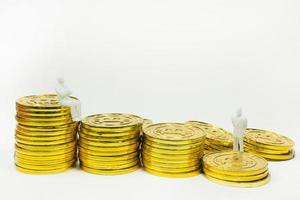 white miniature and gold coin bitcoin abstract image close up background. photo
