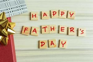 alphabet on small plate on wood table for Father  day image. photo