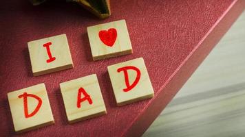 alphabet on small plate on wood table for Father  day image. photo