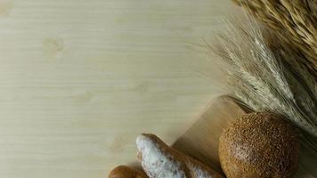 Bread  Wheat oats on wood  image background. photo