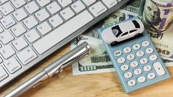 white  toy car  on work station table in office. photo