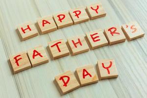 alphabet on small plate on wood table for Father  day image. photo