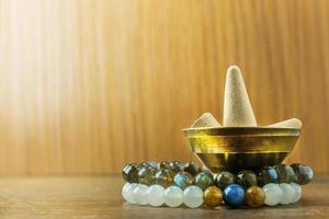 Incense Cone in a stand with the feather for background. photo
