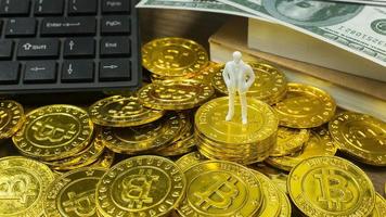 white miniature and gold coin bitcoin abstract image close up background. photo