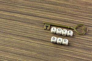 wooden text  for father day content close up image. photo