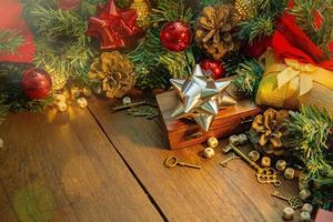 Christmas decorations on wood table for holiday content. photo