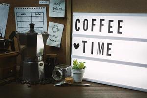 vintage roaster coffee  on wood table. photo