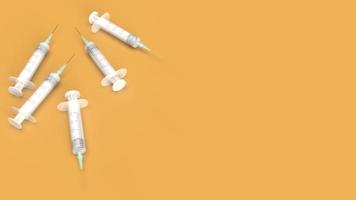 injection needle on orange background 3d rendering for medical content. photo