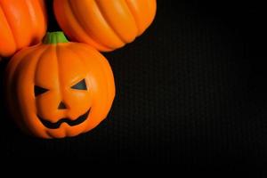 The halloween pumpkin jack in black holiday background image. photo