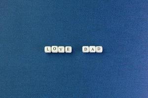 wooden text  for father day content close up image. photo