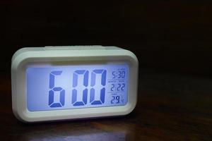 Digital alarm clock  6am close up image. photo