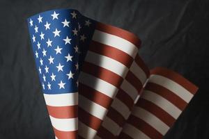 The Veterans Day  concept united states of America flag on black background. photo