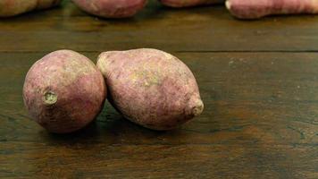 cassava on wood table for food concept. photo