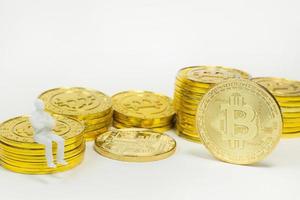 white miniature and gold coin bitcoin abstract image close up background. photo