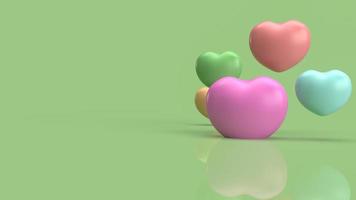 The  heart multi colour   on green background for abstract content 3d rendering photo