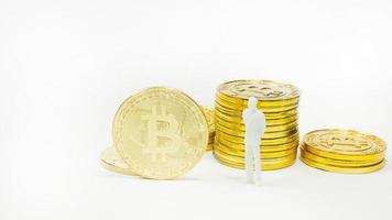 white miniature and gold coin bitcoin abstract image close up background. photo