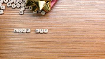 Father Day celebration on wood background top view photo