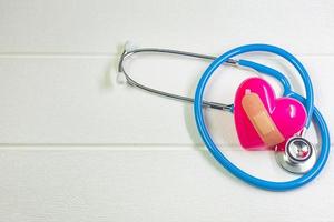 pink Heart and stethoscopes for medical content. photo