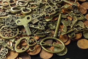 Old vintage keys gold texture on copper coin  abstract background. photo