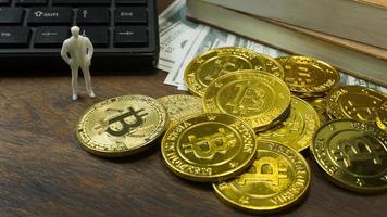 white miniature and gold coin bitcoin abstract image close up background. photo