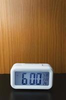 Digital alarm clock  6am close up image. photo