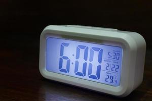 Digital alarm clock  6am close up image. photo