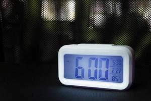 Digital alarm clock  6am close up image. photo