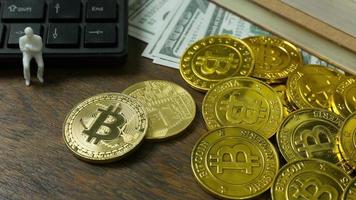 white miniature and gold coin bitcoin abstract image close up background. photo