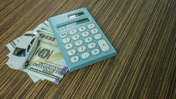 coche y calculadora en mesa de madera para contenido empresarial. foto