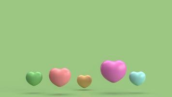 The  heart multi colour   on green background for abstract content 3d rendering photo