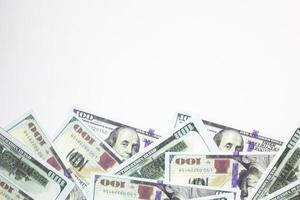 The  Close up 100 dollar banknote on white background for  business content. photo
