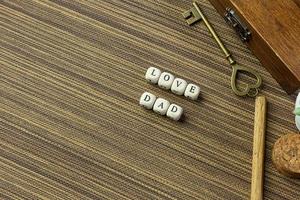 wooden text  for father day content close up image. photo