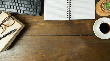 Business person working on wood table Flat lay background. photo