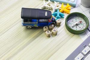 tuktuk on white  office  table for travel content. photo