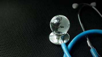 stethoscopes on black background image close up photo
