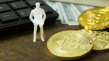 white miniature and gold coin bitcoin abstract image close up background. photo