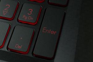 The enter button on keyboard laptop close up image. photo