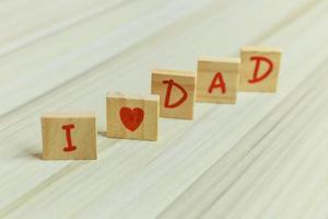 alphabet on small plate on wood table for Father  day image. photo