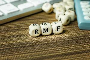 Text RMF on wooden cube for business content. photo