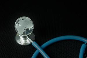 stethoscopes on black background image close up photo